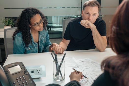 image of a happy couple reviewing finances