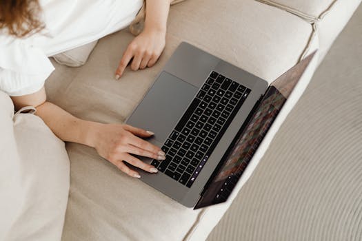 a person relaxing with a laptop