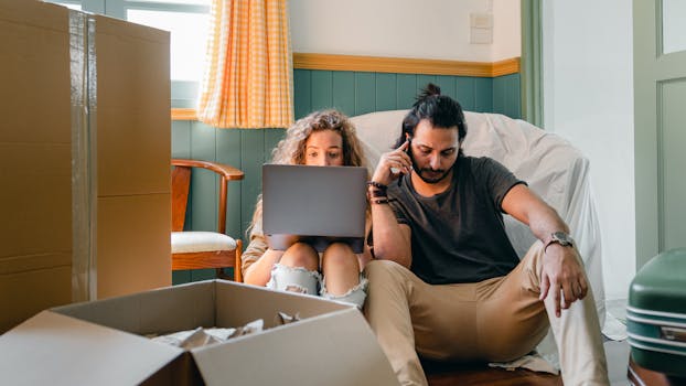 a couple reviewing mortgage options on a laptop