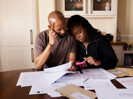 A couple reviewing financial documents