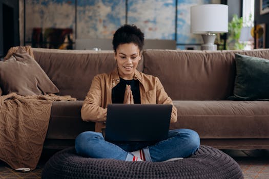 person smiling while reviewing finances