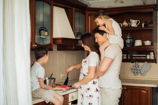 happy family in front of their home