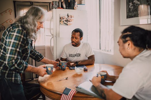 family discussing finances at the kitchen table