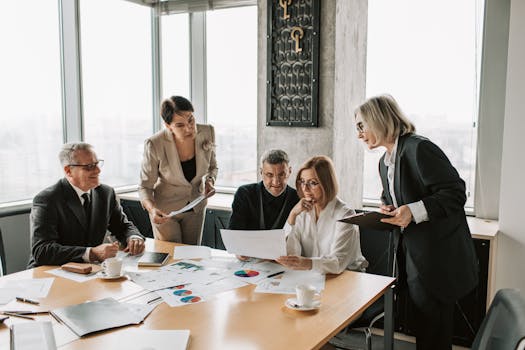 Image of a diverse group of people discussing finances